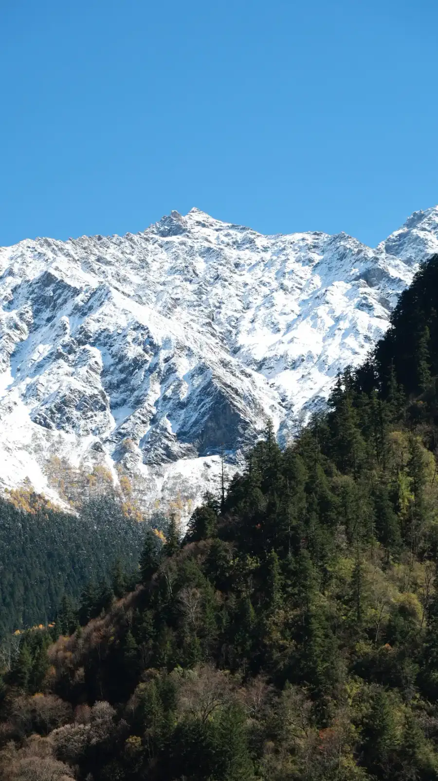 Kawagebo peak of Meili Snow Mountain at sunrise in Yunnan, China